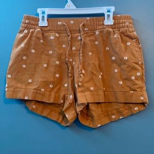 Yellow Shorts With White Flower Print